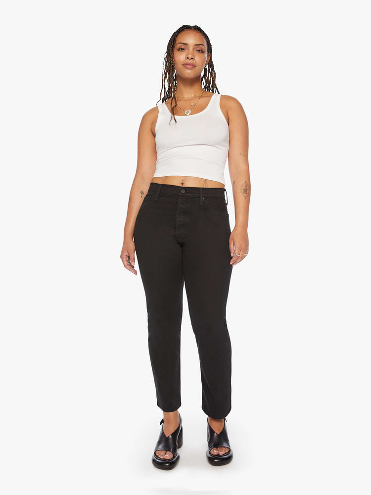 Front view of a women's black straight leg jean with a high rise and ankle length inseam
