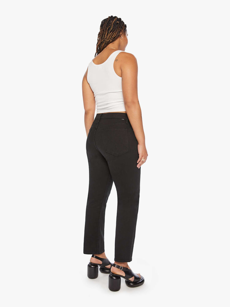Back view of a women's black straight leg jean with a high rise and ankle length inseam