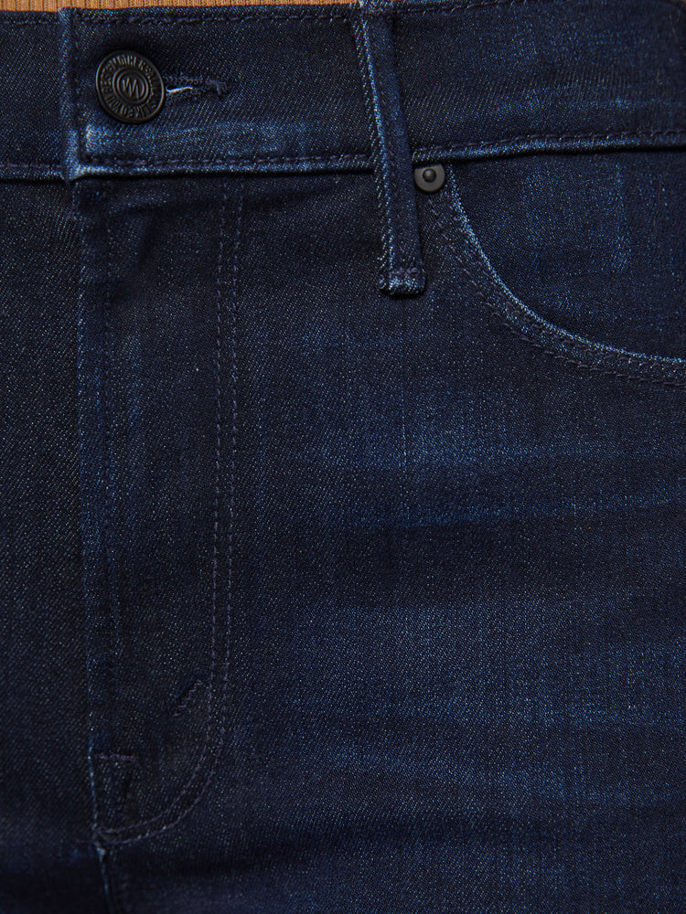 Swatch view of a womens mid rise straight leg jean in a dark blue wash and clean hem.