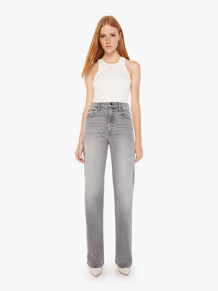 Front view of a grey wash jean featuring a super high rise, a wide leg, and full length clean hem.