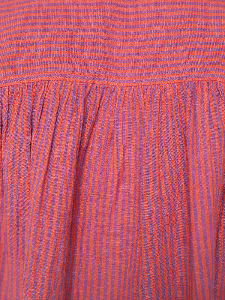 Swatch view of a woman salmon with light purple stripes crewneck blouse with a ruffled collar, puffed shoulders, long balloon sleeves and buttons down the front.