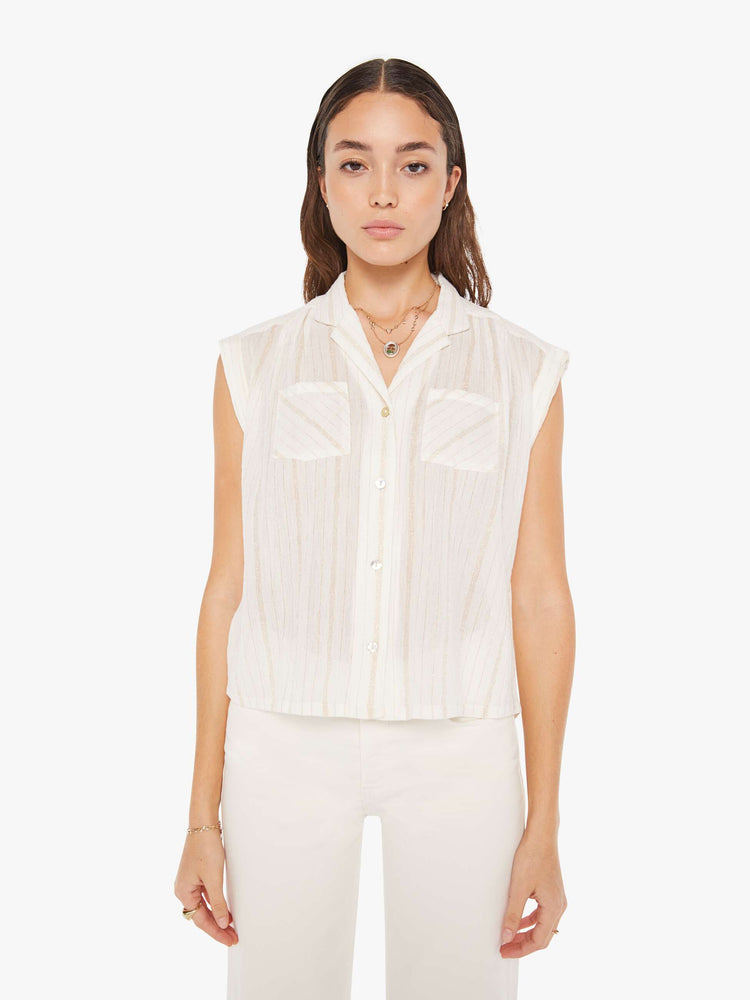 Front view of a womens sleeveless button down shirt featuring a notched collar and two front pockets.