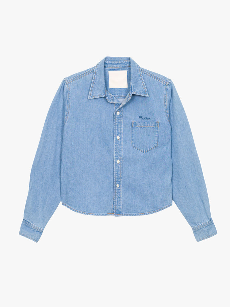 Flat view of a light blue denim shirt featuring a cropped fit and a front pocket.