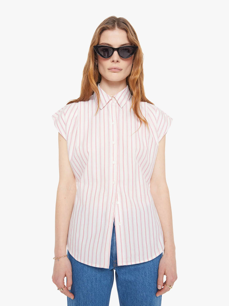 Front view of a light pink stripe pattern  short-sleeve button-up with an angled bodice and a curved hem. 