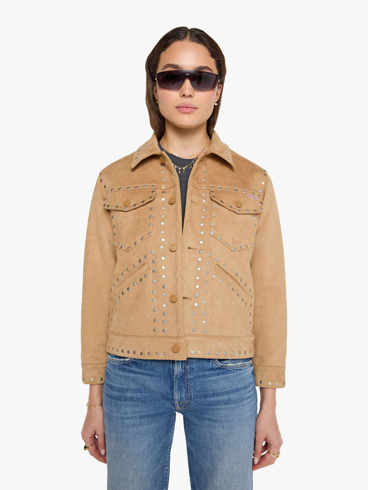 Front view of a woman in a khaki faux suede jacket features studded details throughout and off-white lining with navy doodles.