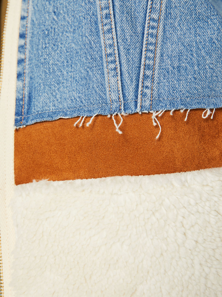 Swatch view of a woman zip-up denim jacket with front patch pockets and a slightly cropped fit in a light blue wash with faux suede panels and sherpa trim.