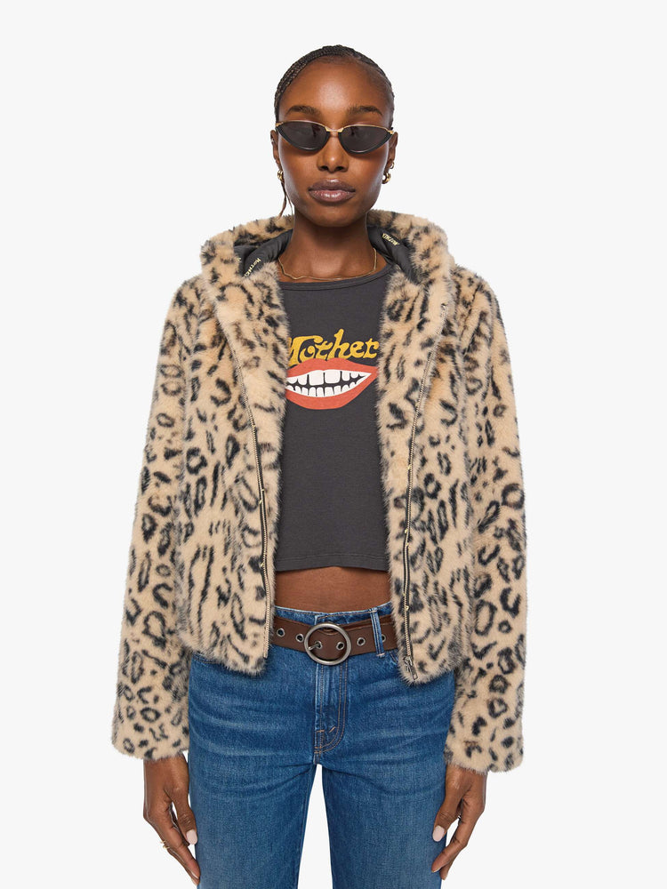 Front view of a woman in a light tan and black cheetah print zip-up hooded jacket with a slightly cropped fit.