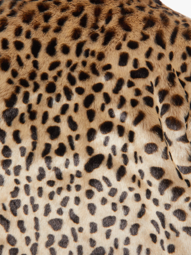 Swatch view of a woman leopard print zip-up collared jacket with a cropped hem and a boxy fit made from faux fur fabric.