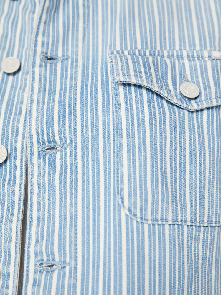 Swatch view of a woman military-inspired denim jacket with front patch pockets and a cropped, frayed hem in a light blue and white striped denim.