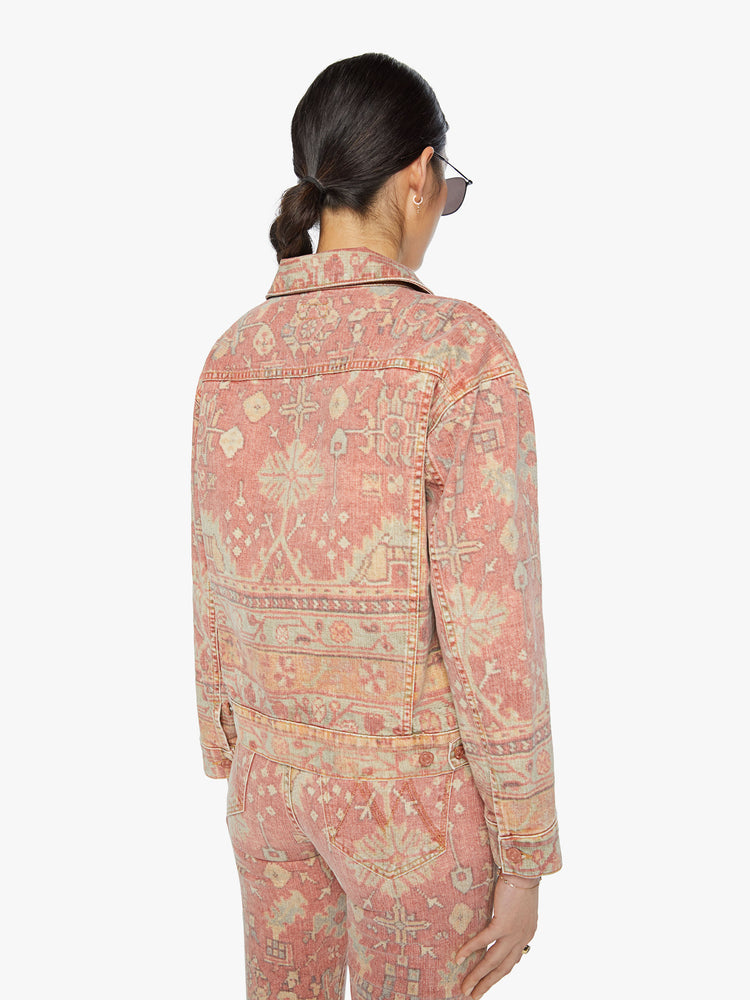 Back view of a woman button-up jacket with drop shoulders, front patch pockets and a cropped, boxy fit in a Moroccan rug print.