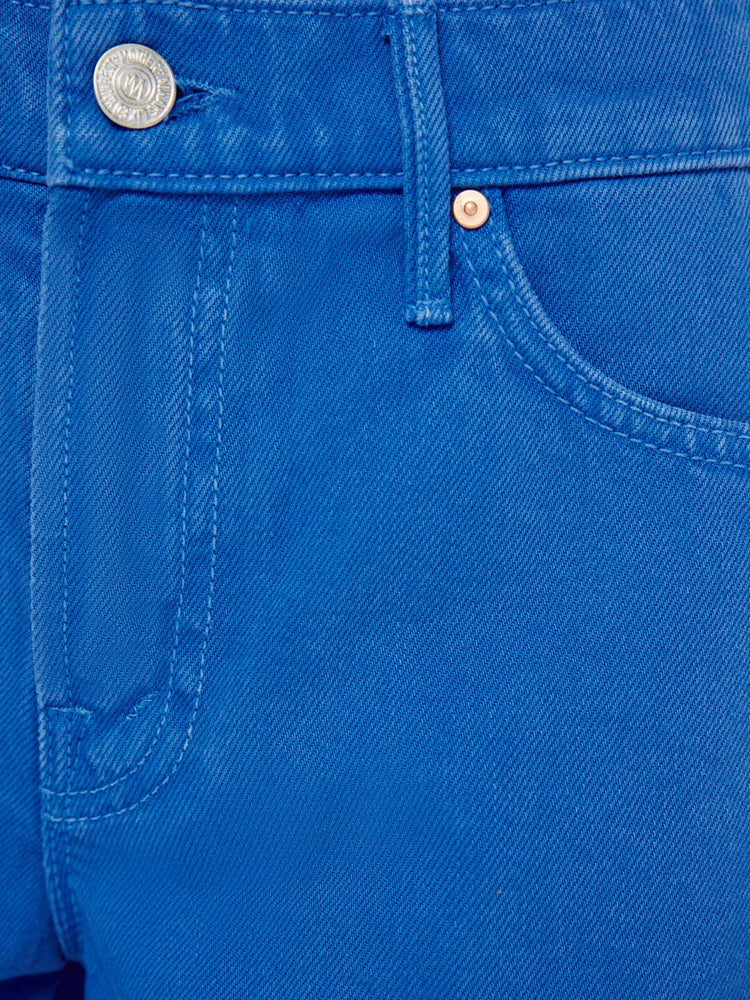 Swatch view of a woman in a primary blue wide-leg shorts with a high rise, zip fly and a 9-inch inseam with a frayed hem.
