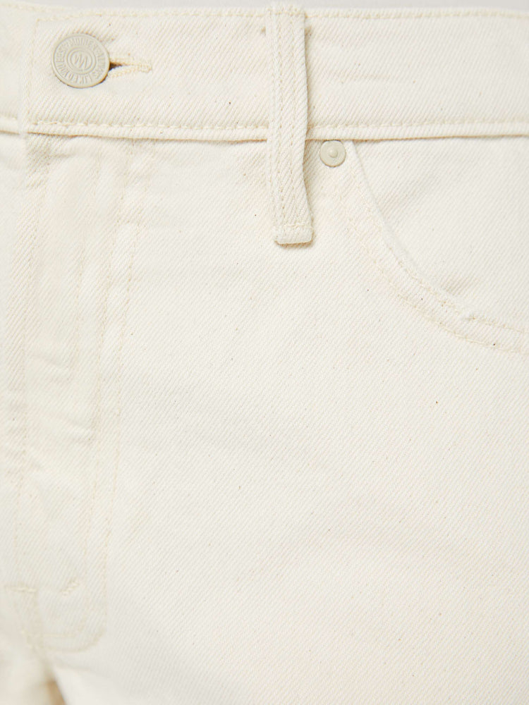 Swatch view of a woman in a creamy white shorts designed to sit lower on the hips with a loose leg, zip fly and a 3.5-inch inseam with a frayed hem.