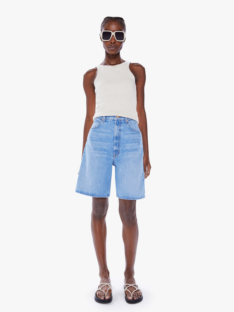 Front view of Wide-leg denim shorts from SNACKS! with a high rise, 8-inch inseam, clean hem in a faded mid-blue wash.