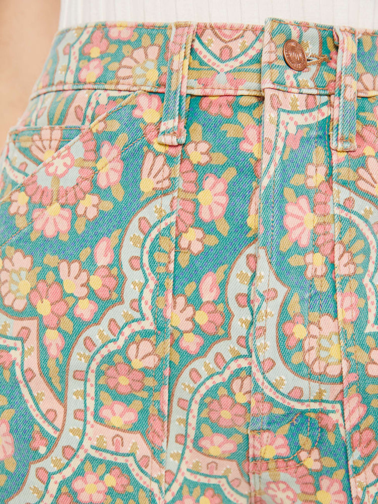 Close up detail view of a colorful print short.