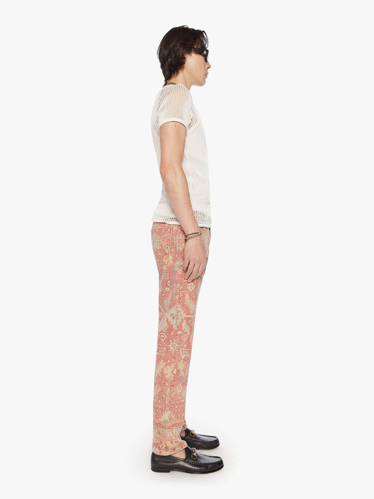 Side view of a men mid-rise straight leg with a 32-inch inseam and a clean hem in a faded tapestry print.