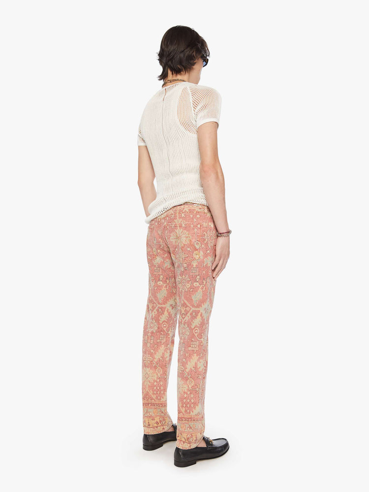 Back view of a men mid-rise straight leg with a 32-inch inseam and a clean hem in a faded tapestry print.