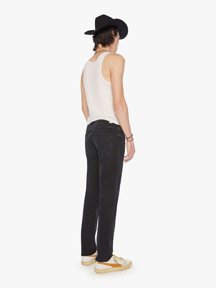 Back view of a men mid-rise straight leg with a 32-inch inseam and a clean hem in a black wash.