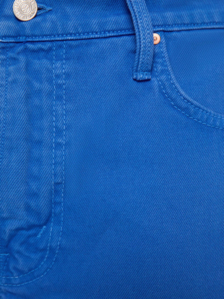 Swatch view of a man in a bright primary  blue loose-fitting jean short with a mid rise, zip fly, knee-length inseam and a clean hem.