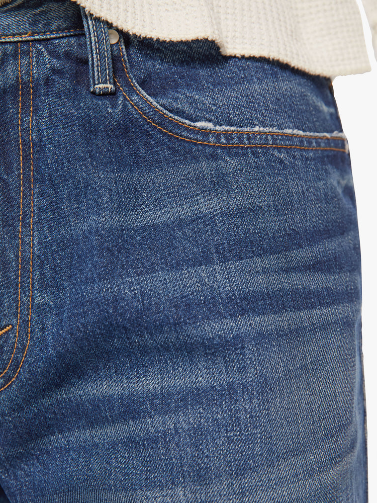 Swatch view of a mens straight-leg jean with a mid rise, ankle-length inseam and a clean hem in a dark blue wash.