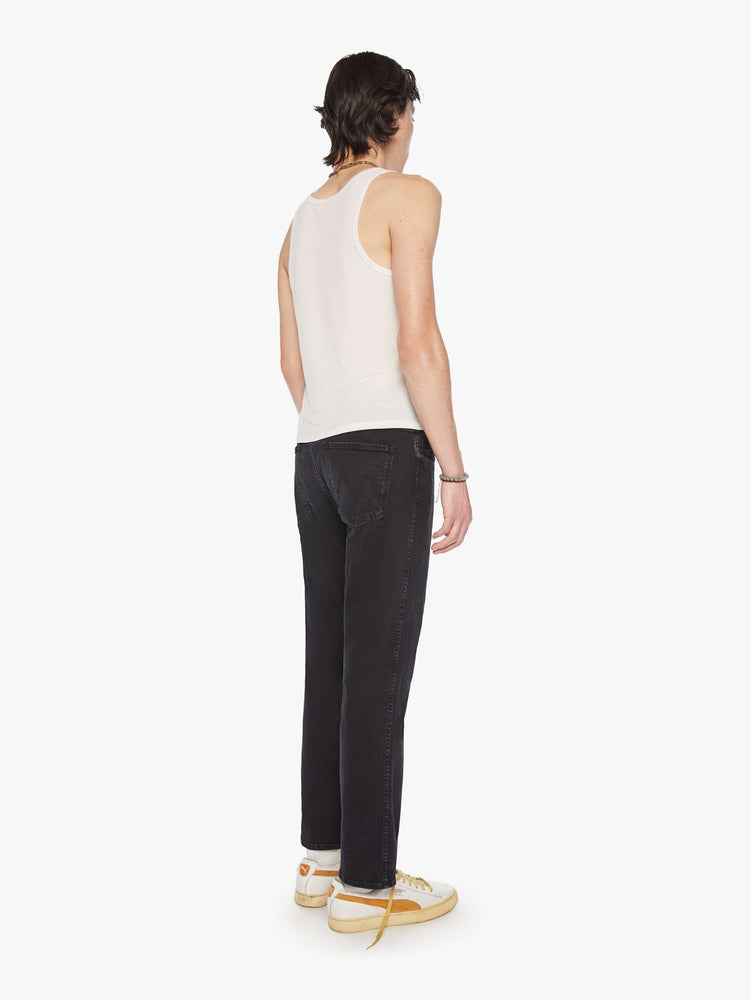 Back view mens straight-leg jean with a mid rise, ankle-length inseam and a clean hem in a black wash.