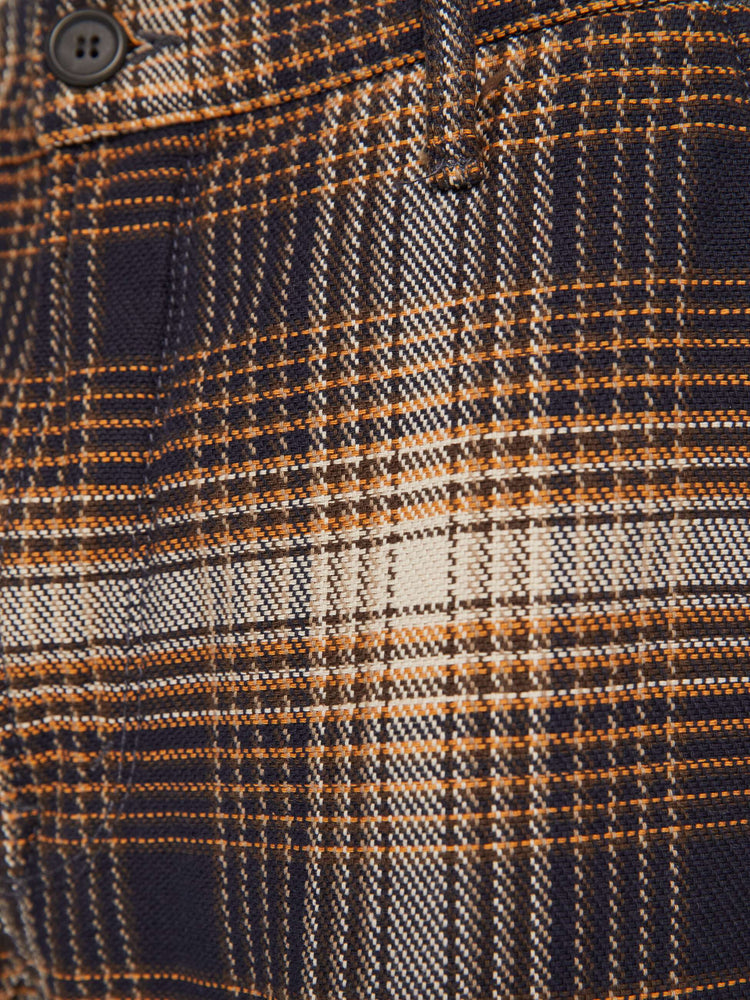 Swatch view of a mens classic pant with slash pockets and a relaxed, slim-straight leg in a vintage-inspired navy, white and orange plaid print.