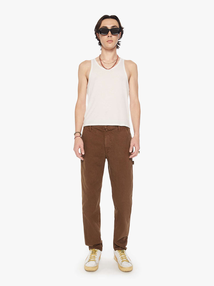 Front view of a men classic pant with utilitarian pockets, a hammer loop and relaxed leg in a dark brown wash.