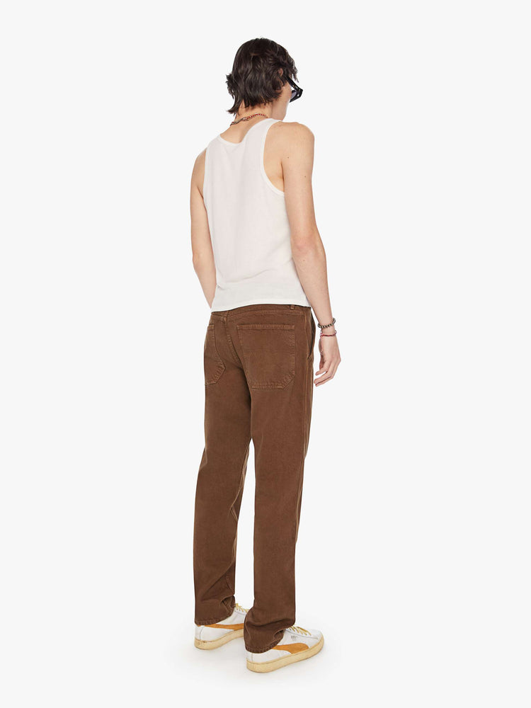 Back view of a men classic pant with utilitarian pockets, a hammer loop and relaxed leg in a dark brown wash.