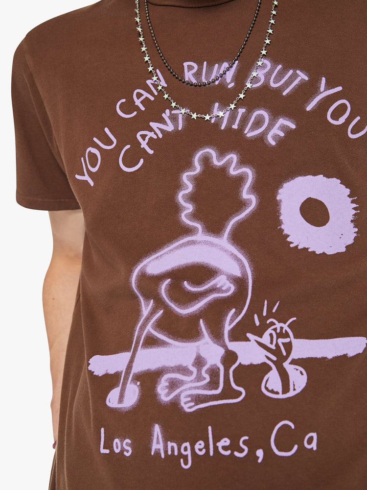 Swatch view of a men classic crewneck tee with short sleeves in brown with lavender roadrunner graphic.
