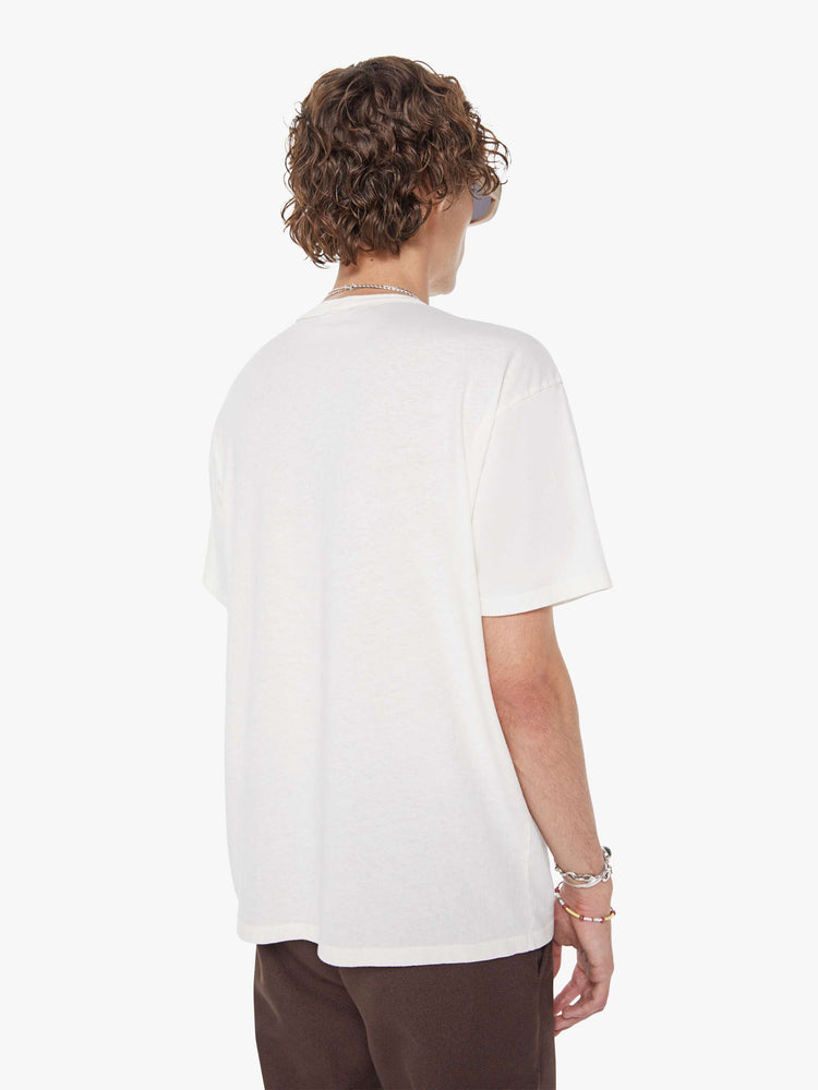MEN back view in white oversized tee features a faded biker graphic and MOTHER's name in black on the front.