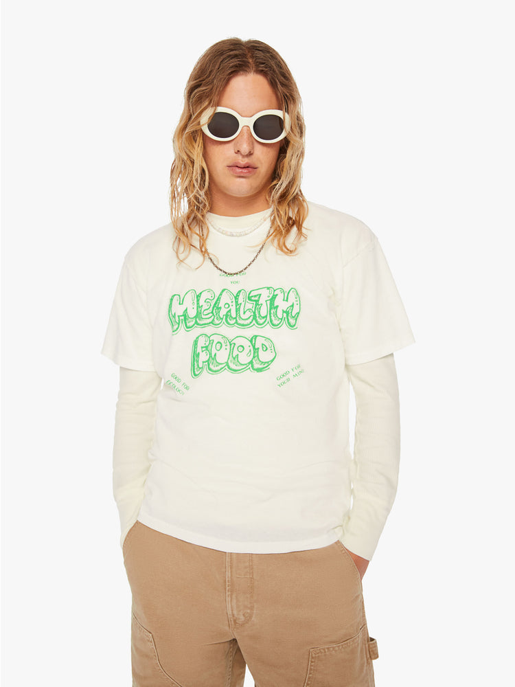 Front view of a men off-white oversized tee with drop shoulders with lime green text.