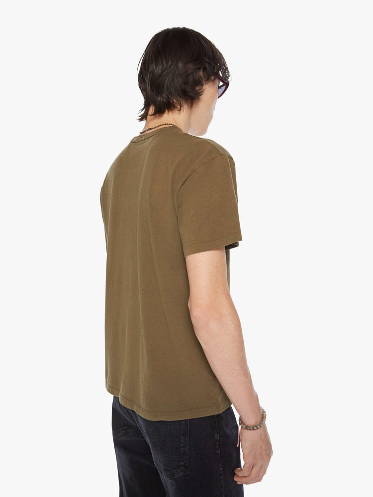 Back view of a men olive-brown hue oversized tee with drop shoulders and a loose fit with a desert themed graphic.