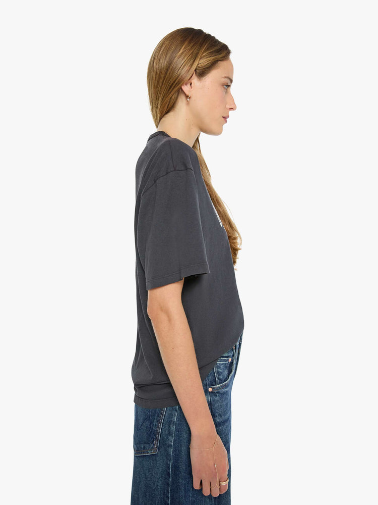 WOMAN side view in a dark grey tee features a tiger graphic and MOTHER's name in block text on the front.