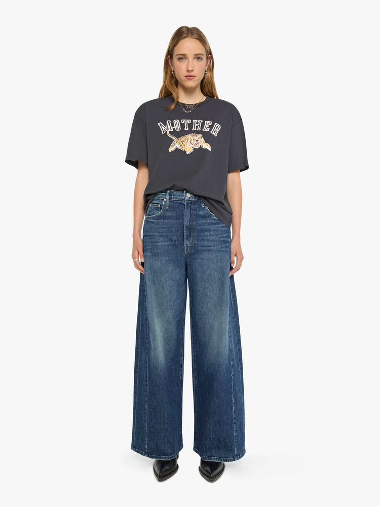 WOMAN back view in a dark grey tee features a tiger graphic and MOTHER's name in block text on the front.