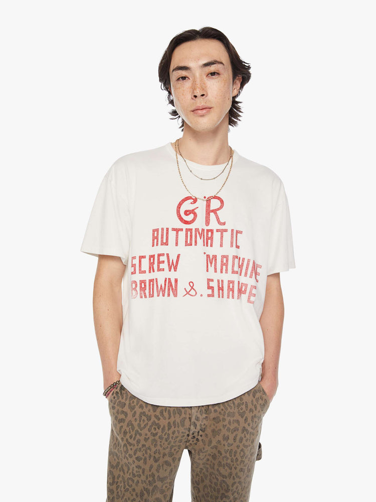 Front view of a men white with faded red text oversized tee with drop shoulders and a loose fit. 