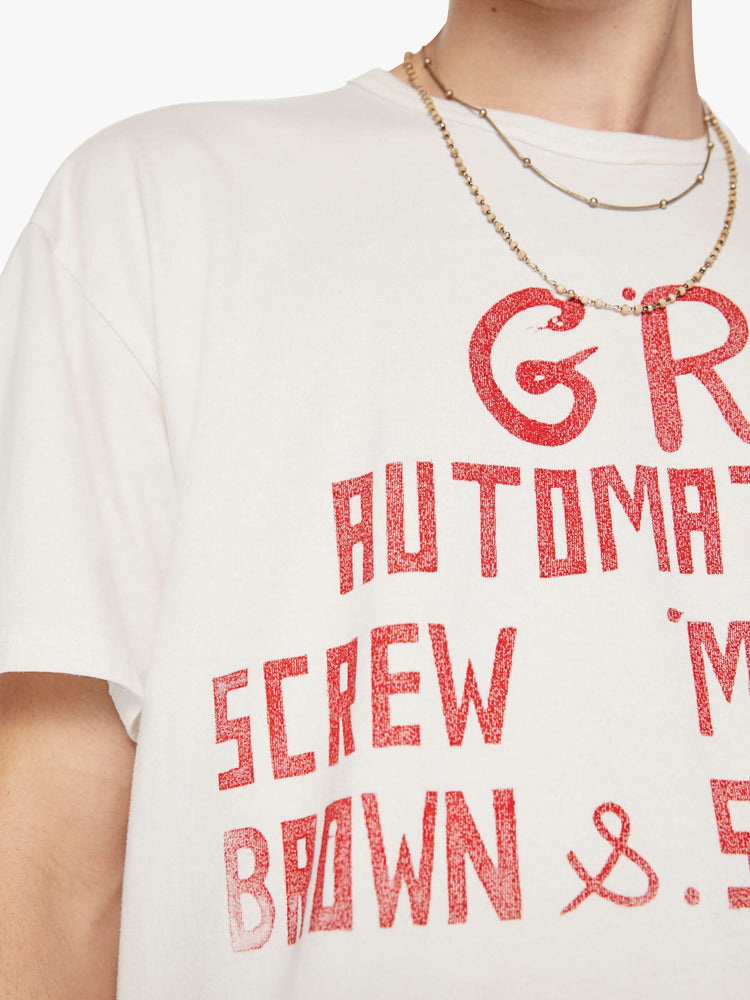 Swatch  view of a men white with faded red text oversized tee with drop shoulders and a loose fit.