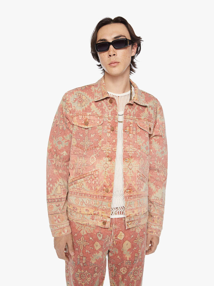 Front view of a men collared jacket with drop shoulders, patch pockets, slit pockets and a slightly shrunken fit in a faded tapestry inspired print.