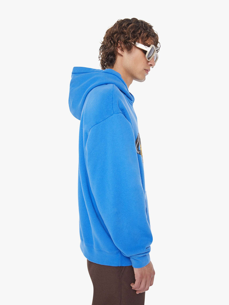 MEN side view of an oversized hoodie with drop shoulders, ribbed hems and a front patch pocket. 