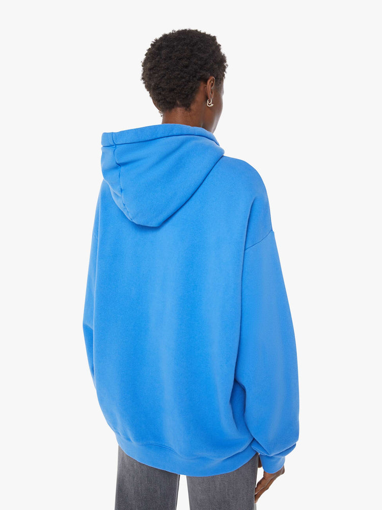 WOMAN back view of an oversized hoodie with drop shoulders, ribbed hems and a front patch pocket. 