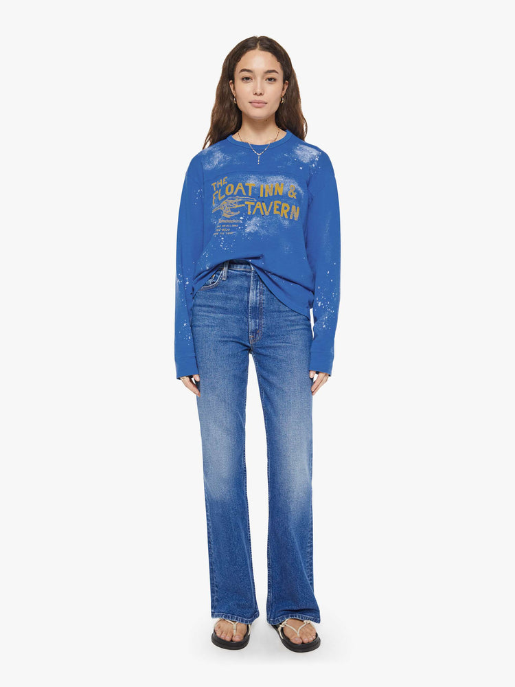 WOMAN front full body view in a rugby-style tee with a crew neck, long sleeves and a boxy fit.