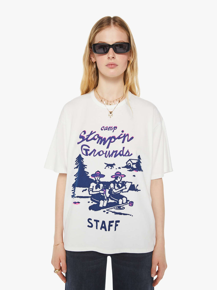 WOMAN front view in an oversized tee in white with hand-drawn graphic in blue and pink on the front inspired by a camp counselor tee.