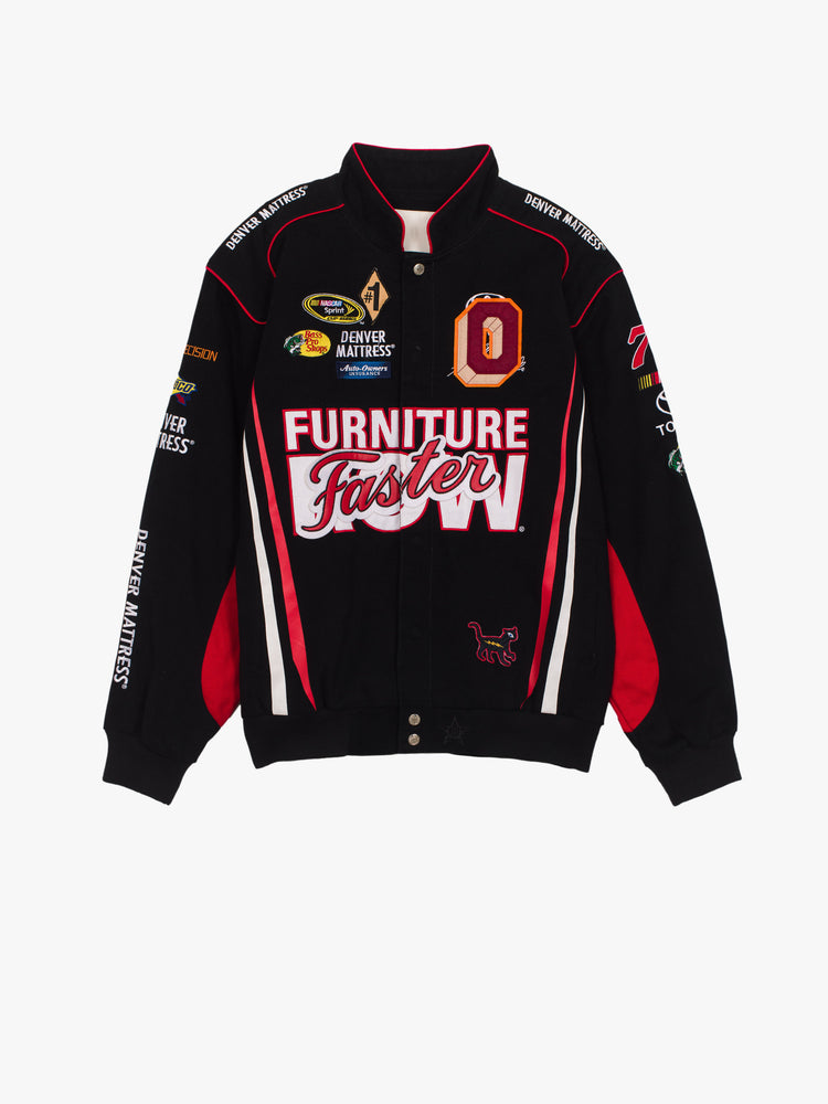 Front flat of a black race car jacket featuring patches all over.