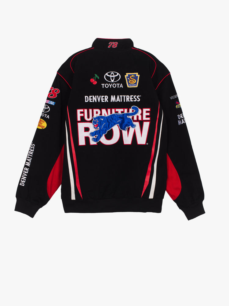 Back flat of a black race car jacket featuring patches all over.