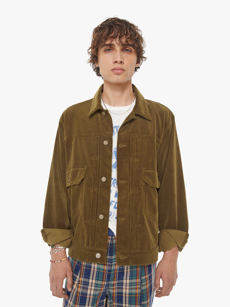 Front view of a man button-up with oversized patch pockets, drop shoulders, extra-long sleeves and a loose fit. 