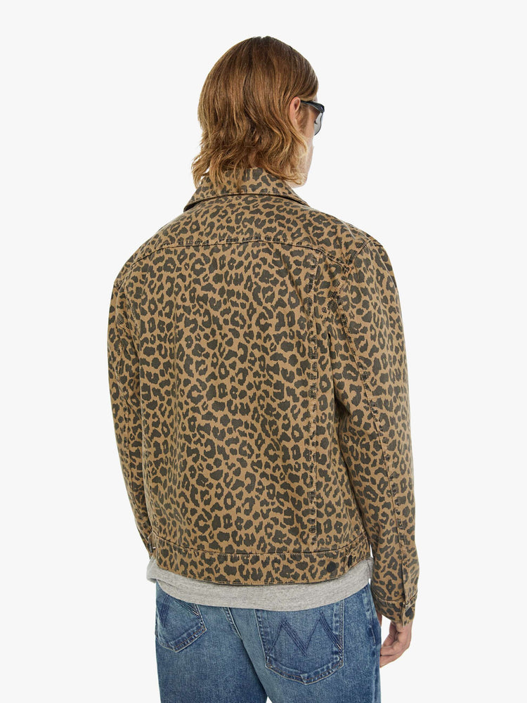 Back view of a man in a leopard print classic button-up jacket with a collared neck, patch pockets and a boxy fit.