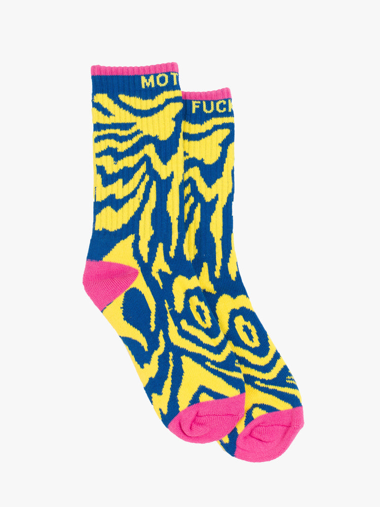 Flat side view of classic tube socks with an explicit message in a bright yellow and blue zebra print with hot pink details and text in yellow.