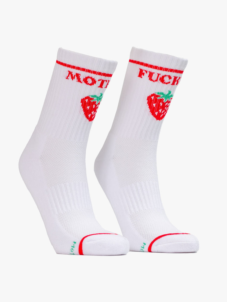 A pair of white socks with strawberries and the words "MOTHER" "FUCKER" in red.