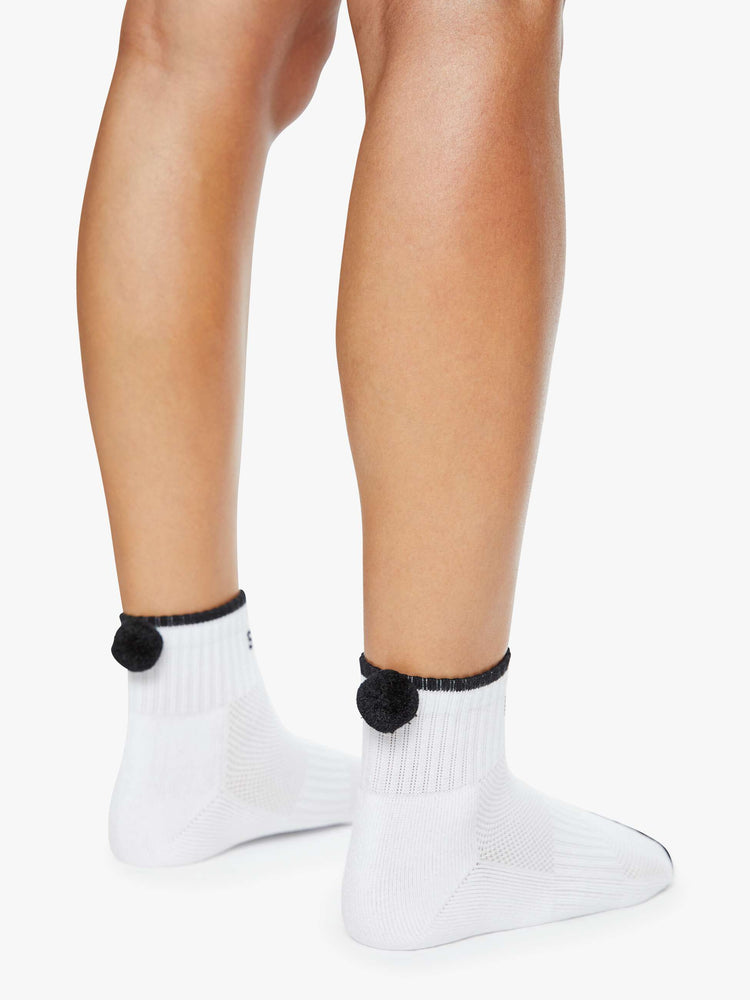 MOTHER'S classic tube sock now in an ankle style in white with black text and stripes on model.