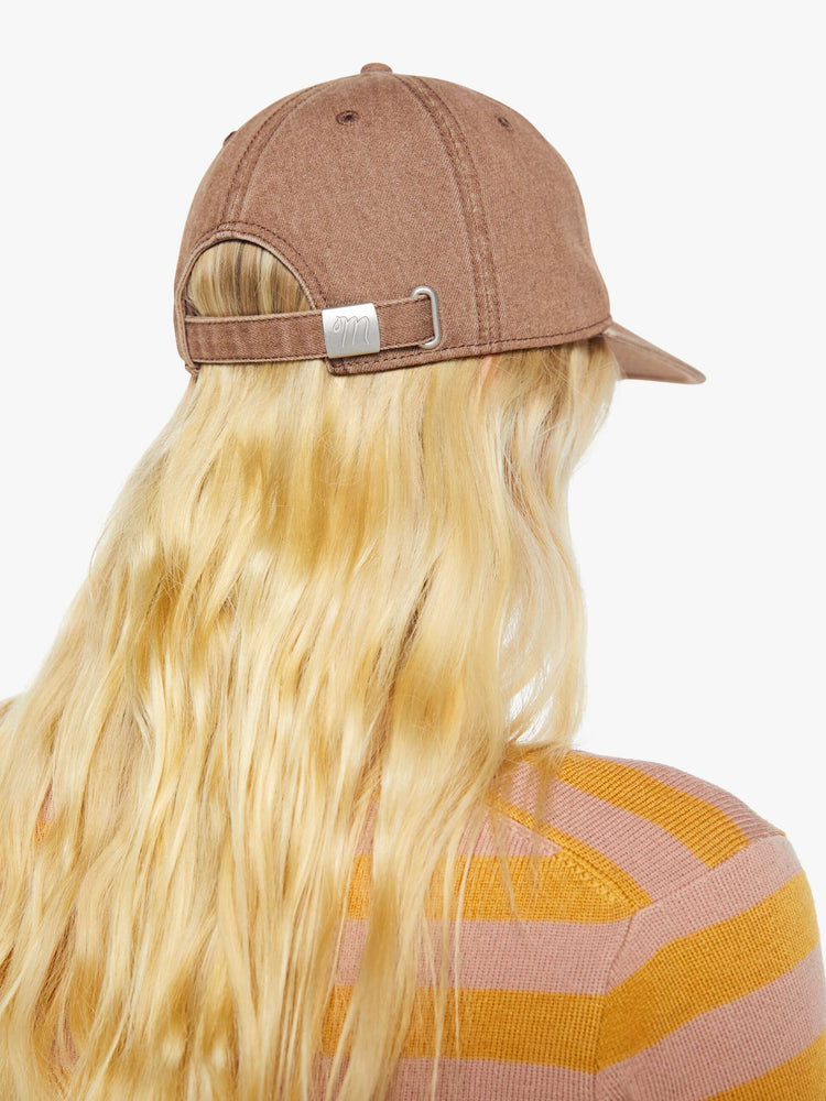 Back on model view of a dad hat designed in faded brown with MOTHER's name embroidered in white cursive on the front.