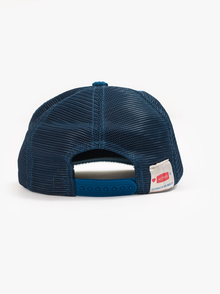 Back view of a vintage-inspired trucker hat designed in blue corduroy and mesh with an embroidered rainbow graphic and MOTHER's name on the front.