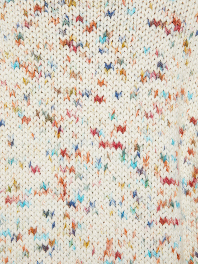 Swatch view of a woman crewneck sweater with drop shoulders, long roomy sleeves and a slightly cropped hem in cream with colorful speckles and text in hot pink.